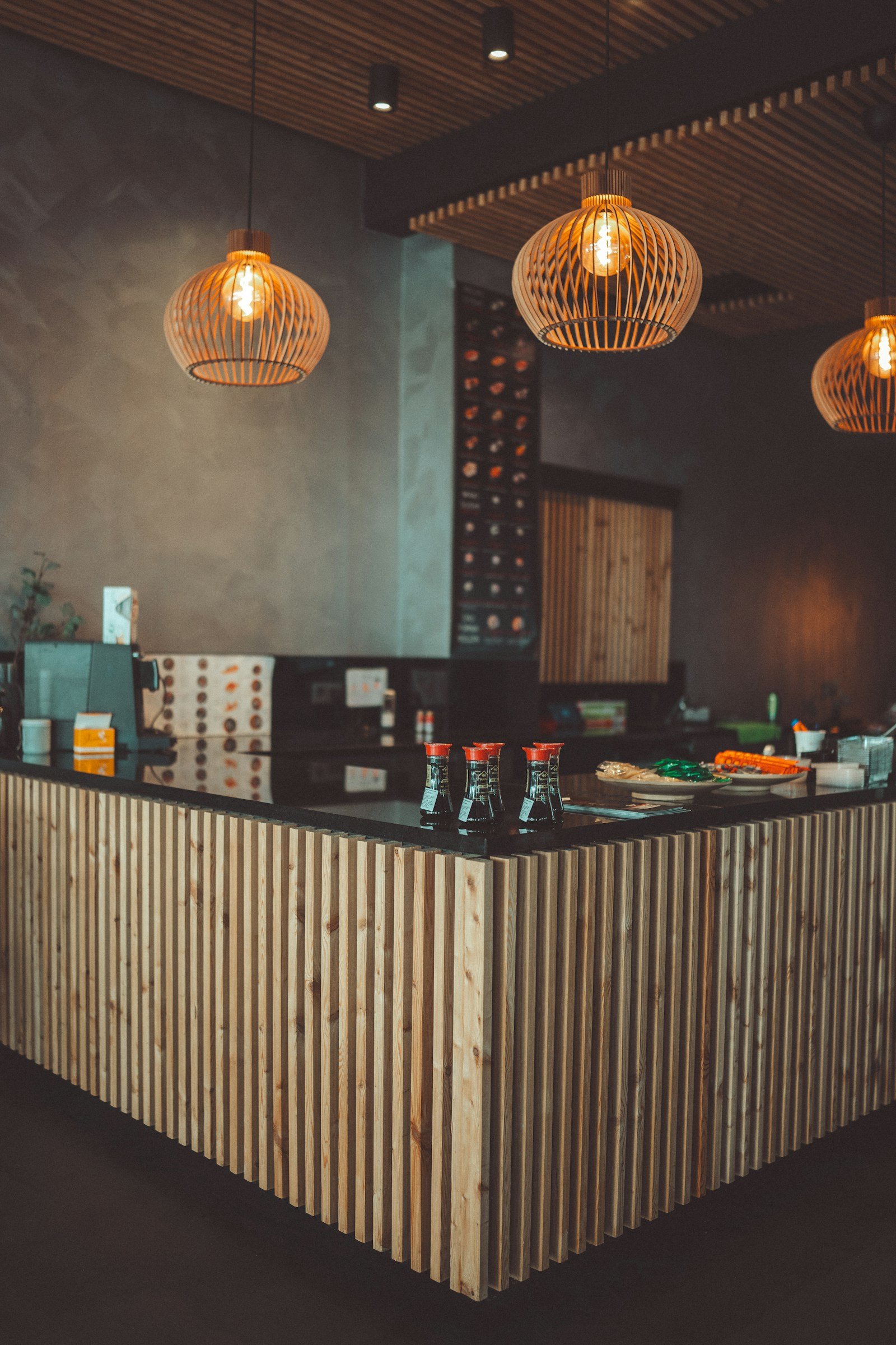 Contemporary restaurant interior with carefully coordinated lighting, furnishings, and finishes